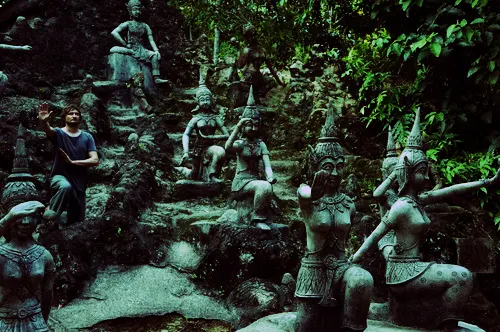 Stone statues of musicians and dancers in the Secret Buddha Garden